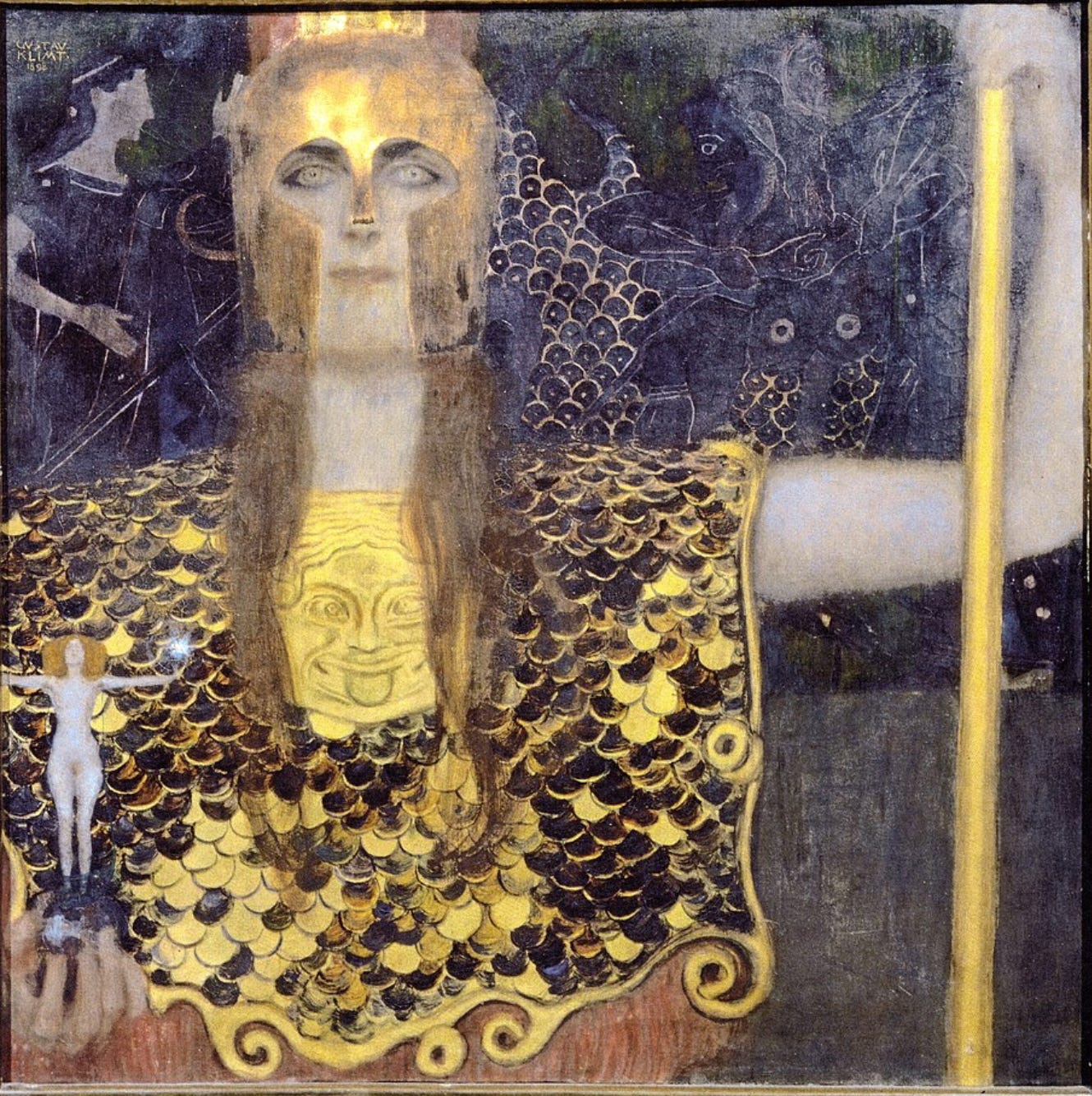Against a background of blues and blacks etched with mystical figures, a woman with light gold-green eyes, wearing a gold helmet and gold-scaled chest armor, stands in a pose of defiance. On the breastbone of the armor is a comic face, eyes crossed, tongue extended. The woman’s left arm is extended, grasping a golden staff; balancing on her right fingertips is a statue of a female figure with arms extended to the heavens, head back as if in praise.