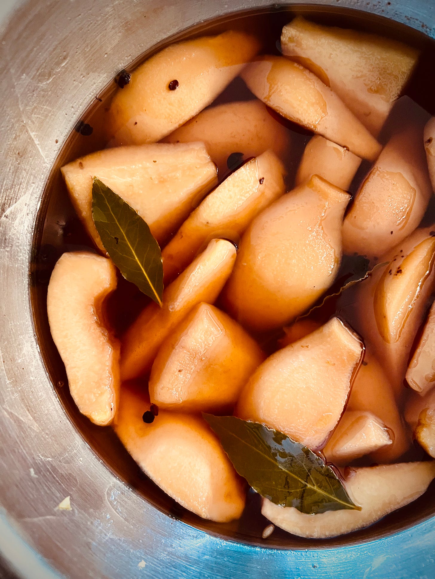 Quince pickling in a saucepan