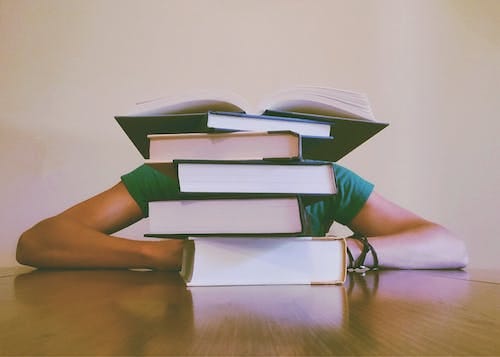 Free Person Behind Books Stock Photo Free Person Behind Books Stock Photo