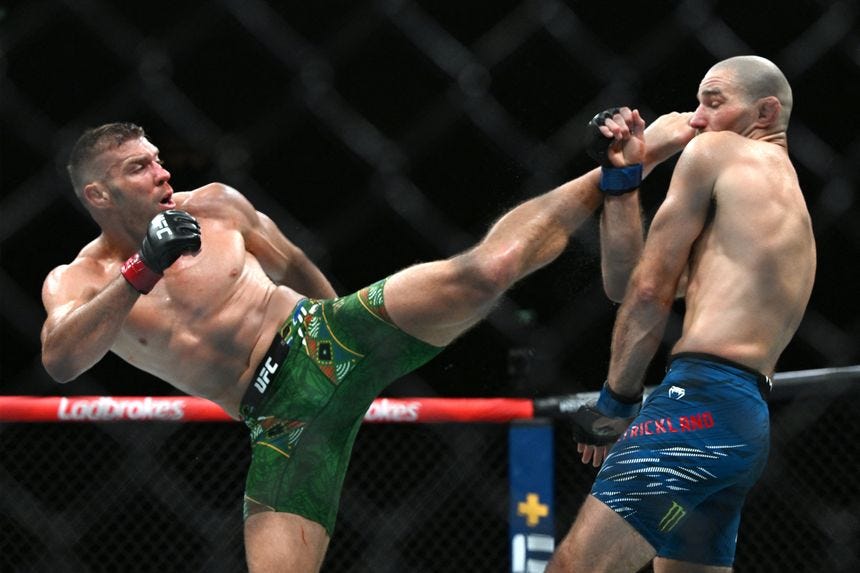 Sean Strickland (right) fell to a second decision loss to Dricus Du Plessis