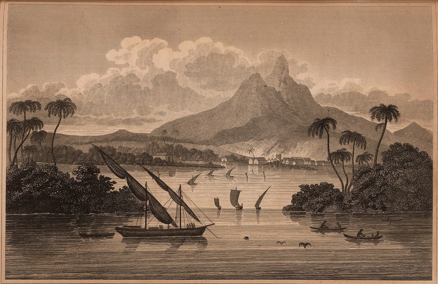 An etching showing a harbour as viewed from the sea, with small boats in the foreground.