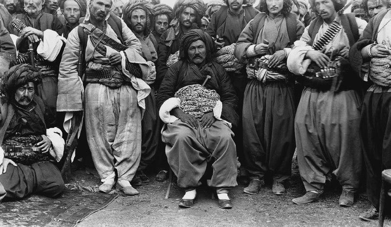 File:Bayz ‘Agha,’ chief of the “Mangur” Kurdish Tribe, and his Mangur Men.jpg