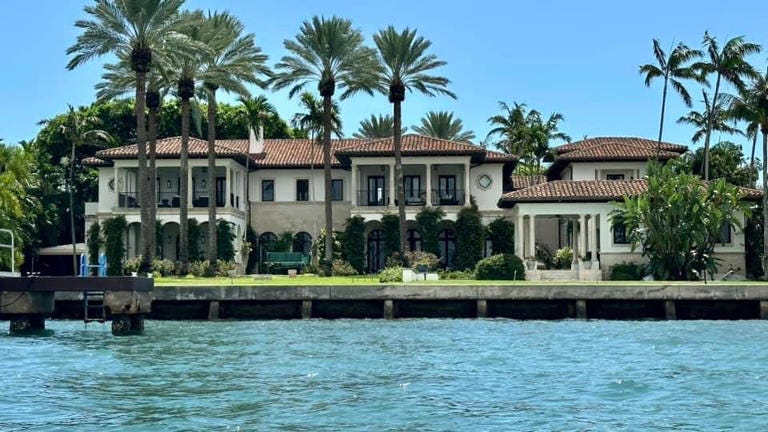 On May 27, 2023, David Chen kayaked at Oleta River State Park near Indian Creek Village in South Florida. Indian Creek is home to celebrities like Tom Brady, Jared Kushner and Ivanka Trump. This is singer Julio Iglesias' home, Chen said. The ultra luxe neighborhood is known as “Billionaire Bunker.” Jeff Bezos, according to news reports, recently bought a second home there. On May 27, 2023, David Chen kayaked at Oleta River State Park near Indian Creek Village in South Florida. Indian Creek is home to celebrities like Tom Brady, Jared Kushner and Ivanka Trump. This is singer Julio Iglesias' home, Chen said. The ultra luxe neighborhood is known as “Billionaire Bunker.” Jeff Bezos, according to news reports, recently bought a second home there.