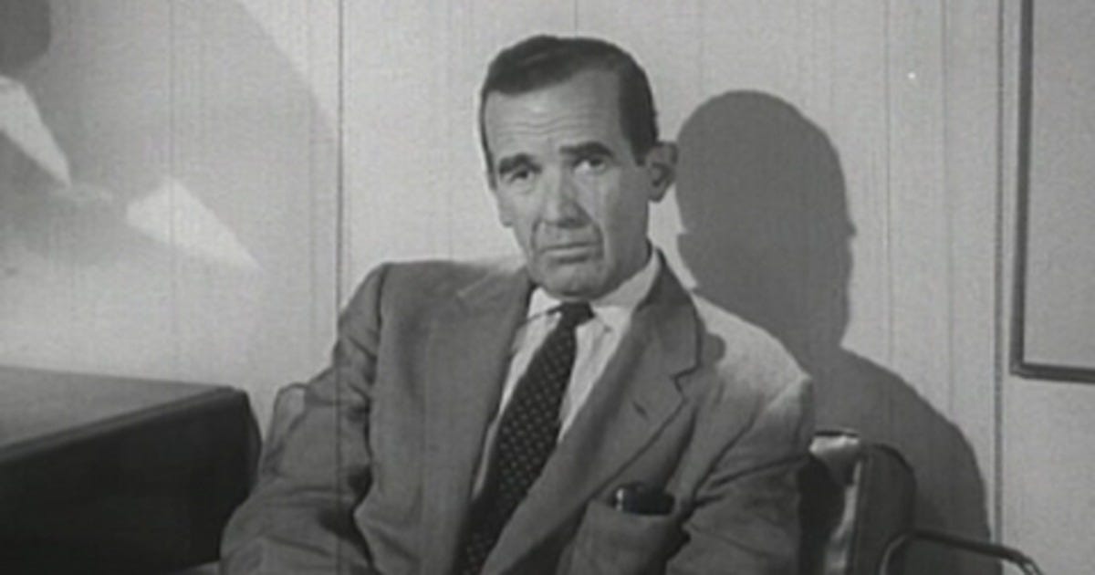 A rather sober moment with Edward Murrow, sitting in black and white in a suit with a heavy look upon his face.