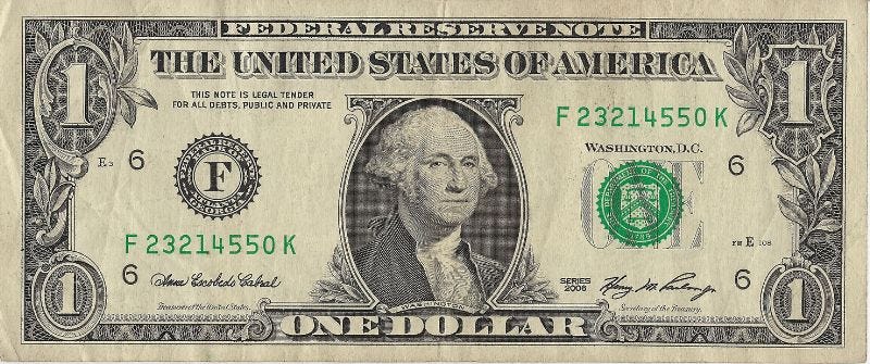A photo of a crumpled dollar bill.