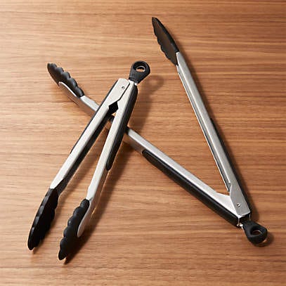 Two sets of metal tongs with rubberized handles