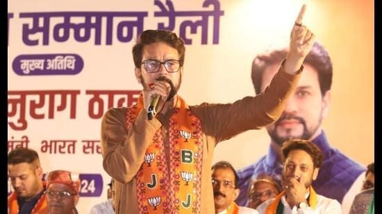 Union minister Anurag Thakur addressing a public rally at Dussehra Ground, Sector 40, in Chandigarh on Wednesday. (HT Photo)