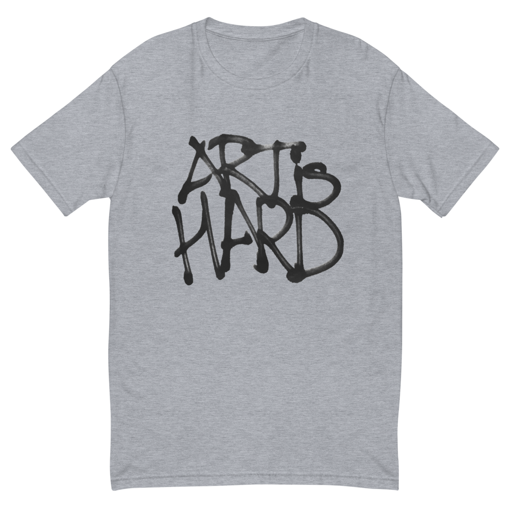 T-shirt that says "Art is Hard" in spray-painted text.