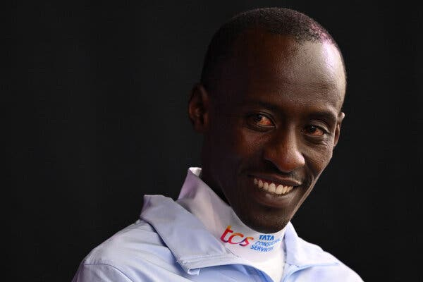 Kelvin Kiptum, the Kenyan marathoner, smiles in a portrait.