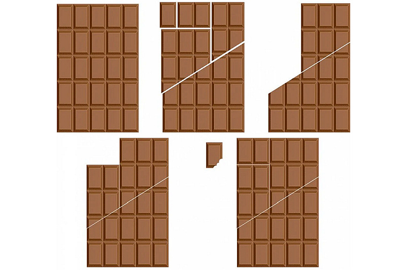 A slab of chocolate cut up into pieces
