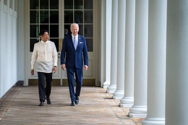 President Biden walking with President Ferdinand R. Marcos Jr. at the White House.