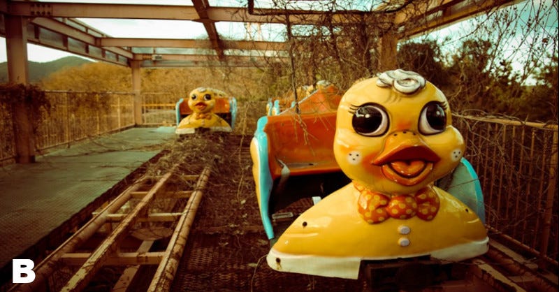Duck kiddie ride in abandoned amusement park--cartoon innocence lost