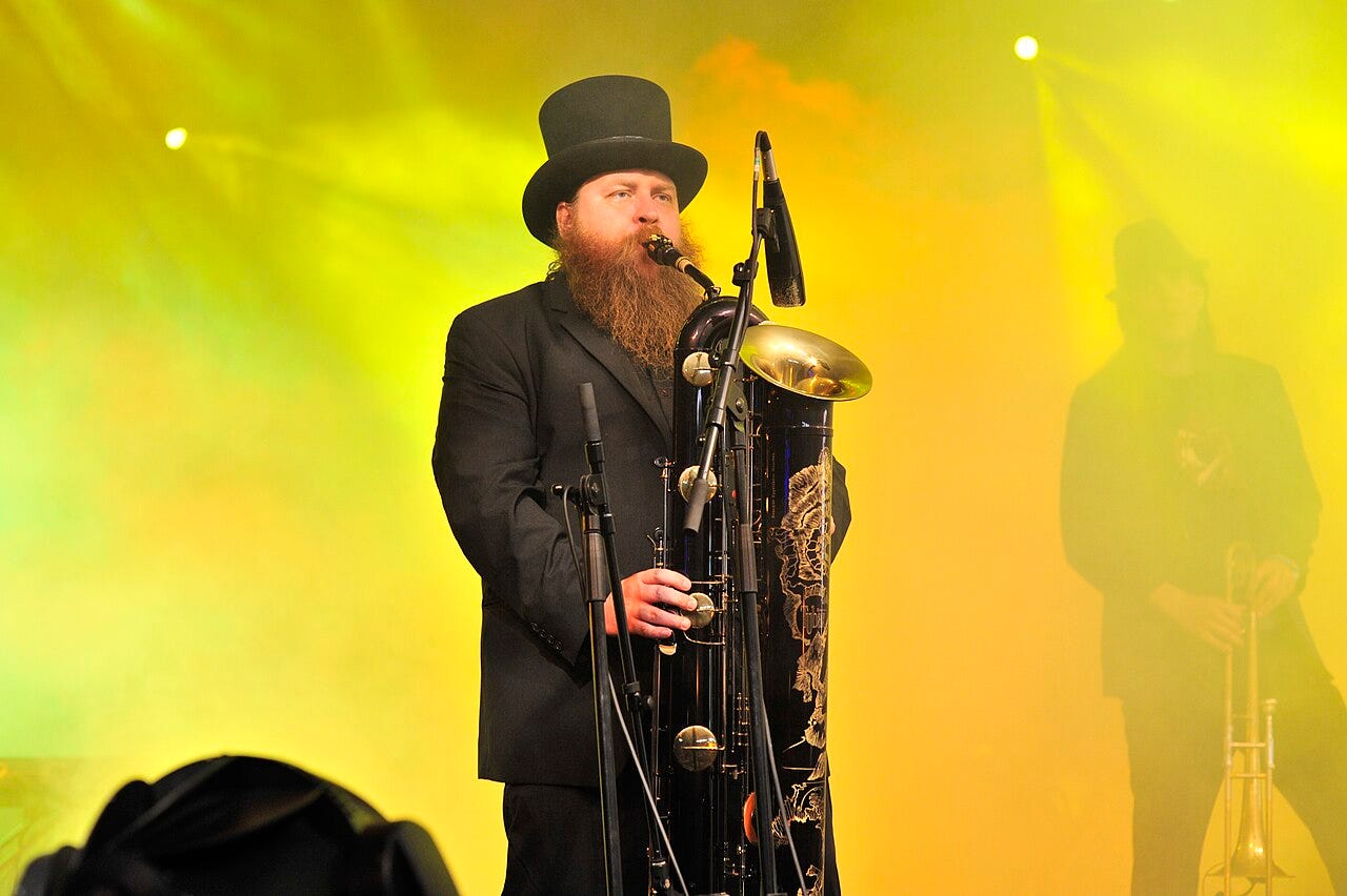 Jarno Sarkula performing with Alamaailman Vasarat at the Roskilde Festival in 2009