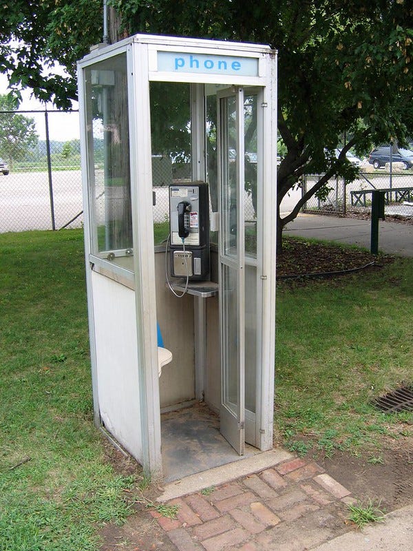 Enclosed phone booth from 1970s