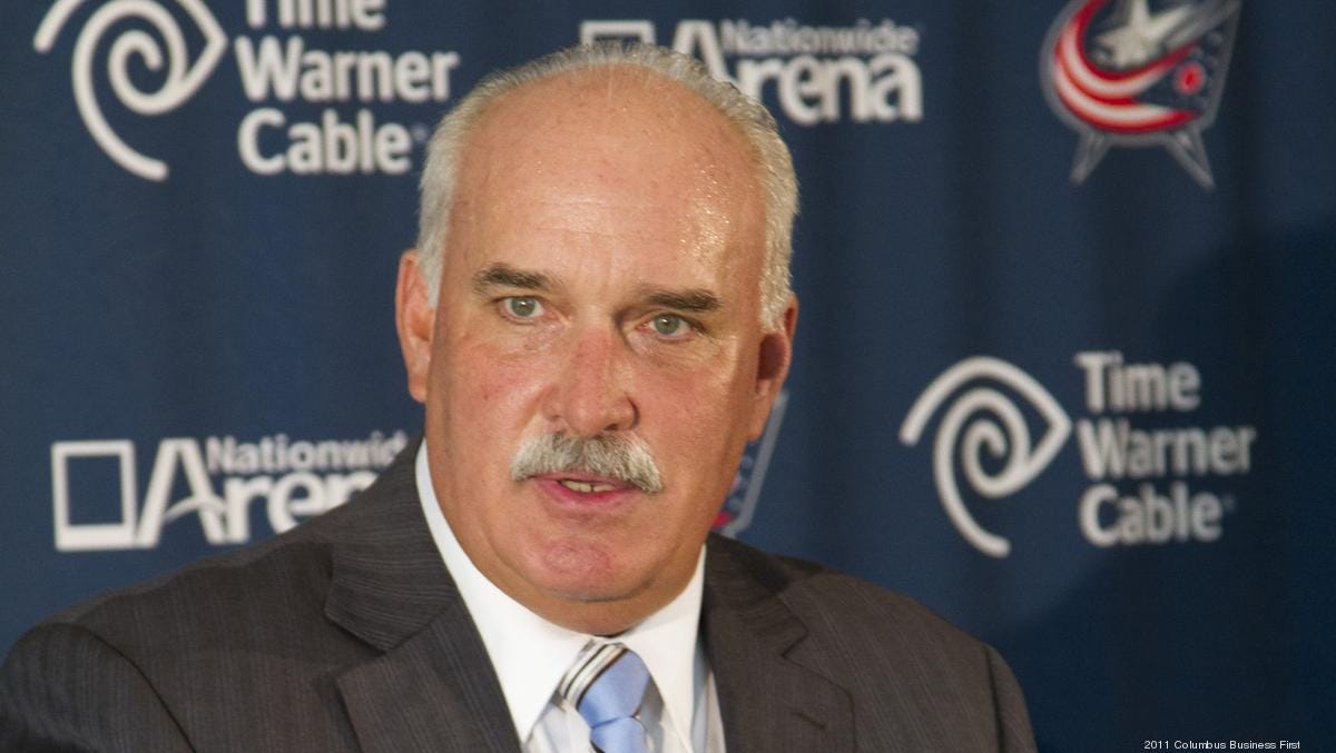 John Davidson, president of hockey operations for the Blue Jackets speaking during a press conference.