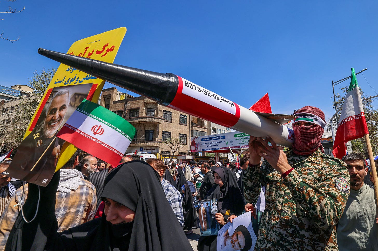 Iranians attend the funeral procession for seven Islamic Revolutionary Guard Corps members killed in a strike on Syria in Tehran, Iran on April 5.