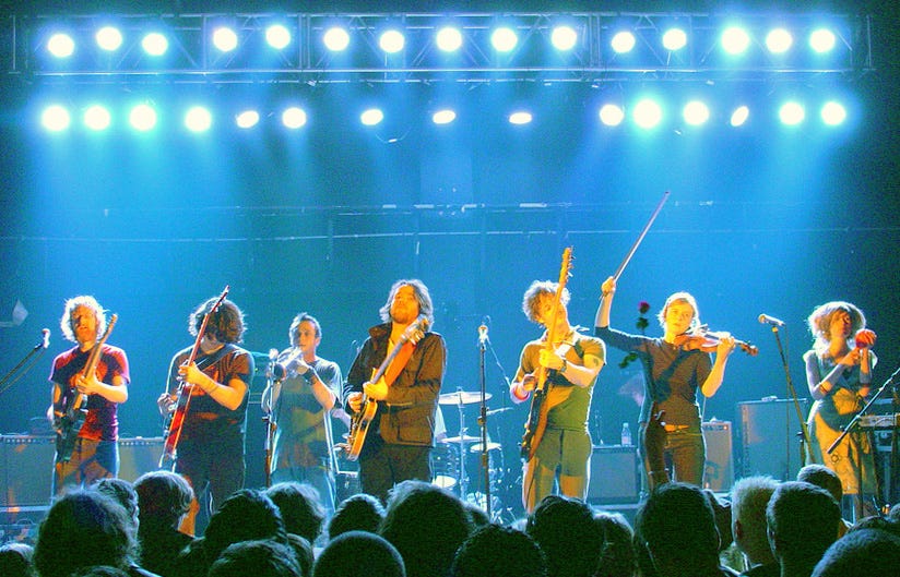 Broken Social Scene performing in England in 2006. Left to right: Brendan Canning, Ohad Benchetrit, Torquil Campbell, Kevin Drew, Andrew Whiteman, Julie Penner, Lisa Lobsinger