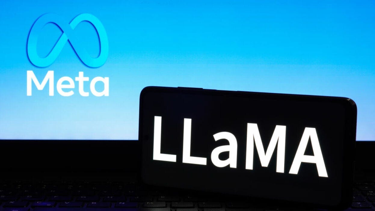 Llama logo on a smartphone in front of the Meta logo