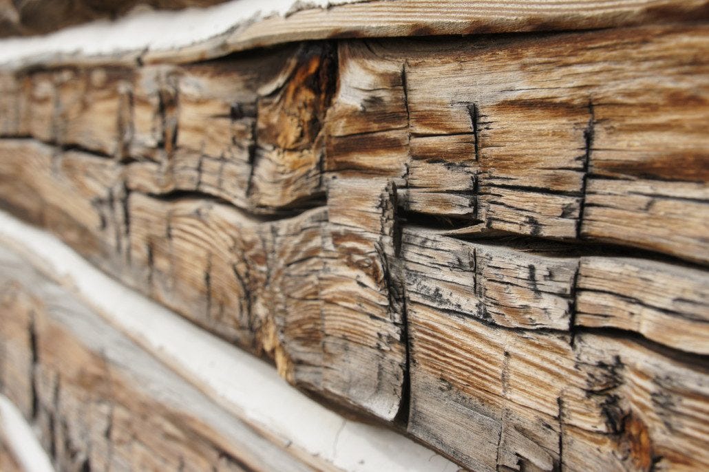 Slash marks from an adze on an old cabin in Bannack.