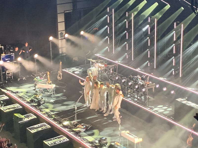 performers waving to the audience