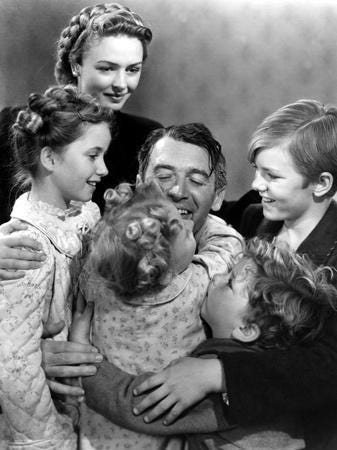 George Bailey and family after he is saved by Angel Clarence