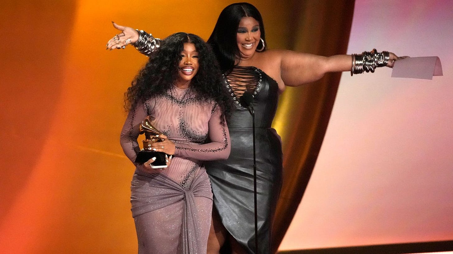 SZA shows love to Lizzo in emotional Grammys speech | CNN