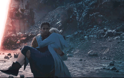 This GIF (repeated moving image) shows Yaz Khan (played by Mandip Gill) carrying the Thirteenth Doctor (played by Jodie Whittaker) away from a large energy beam that's just struck the Doctor, provoking her forthcoming regeneration. This GIF (repeated moving image) shows Yaz Khan (played by Mandip Gill) carrying the Thirteenth Doctor (played by Jodie Whittaker) away from a large energy beam that's just struck the Doctor, provoking her forthcoming regeneration.