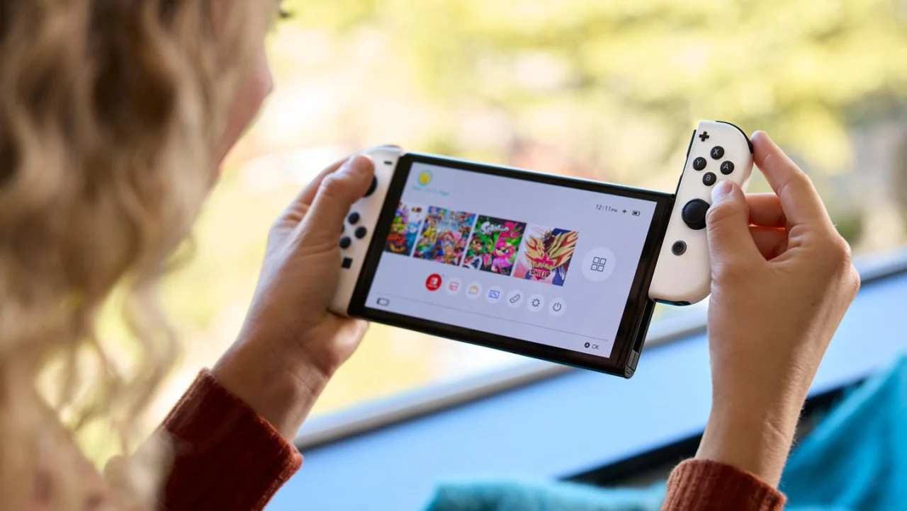 Woman using a Nintendo Switch OLED