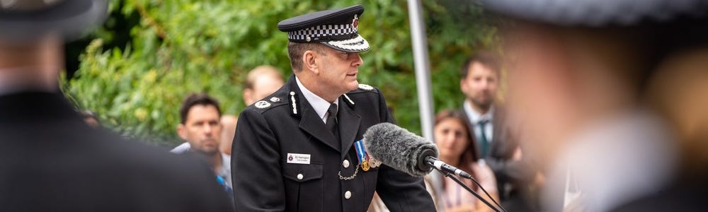 Chief Constable BJ Harrington addressing guests at a passing out parade