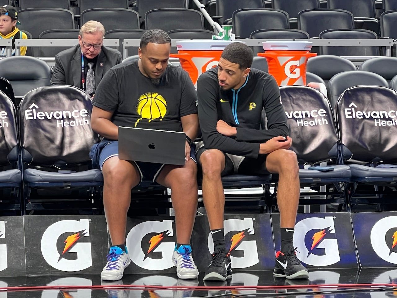 Tyrese Haliburton reviews film pregame with Pacers player development coach Isaac Yacob.