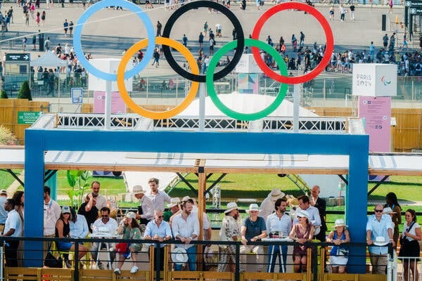 A line of spectators in a stand.