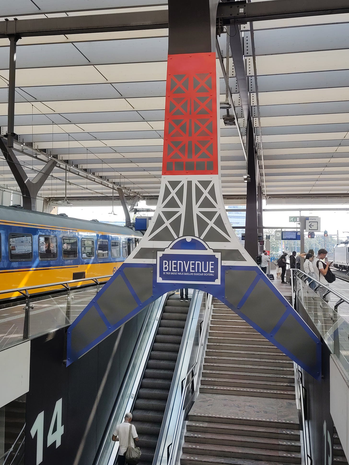 Support beams at the Rotterdam Central station decorated like the Eiffel Tower