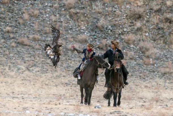 FIG 2.9. Amanbol and Bazarbai, brother and sister eagle hunters, 2014. 