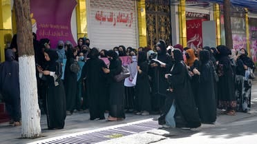Afghan women stage a protest for their rights at a beauty salon in the Shahr-e-Naw area of Kabul on July 19, 2023. Afghanistan's Taliban authorities have ordered beauty parlours across the country to shut within a month, the vice ministry confirmed the latest curb to squeeze women out of public life. (Photo by AFP)