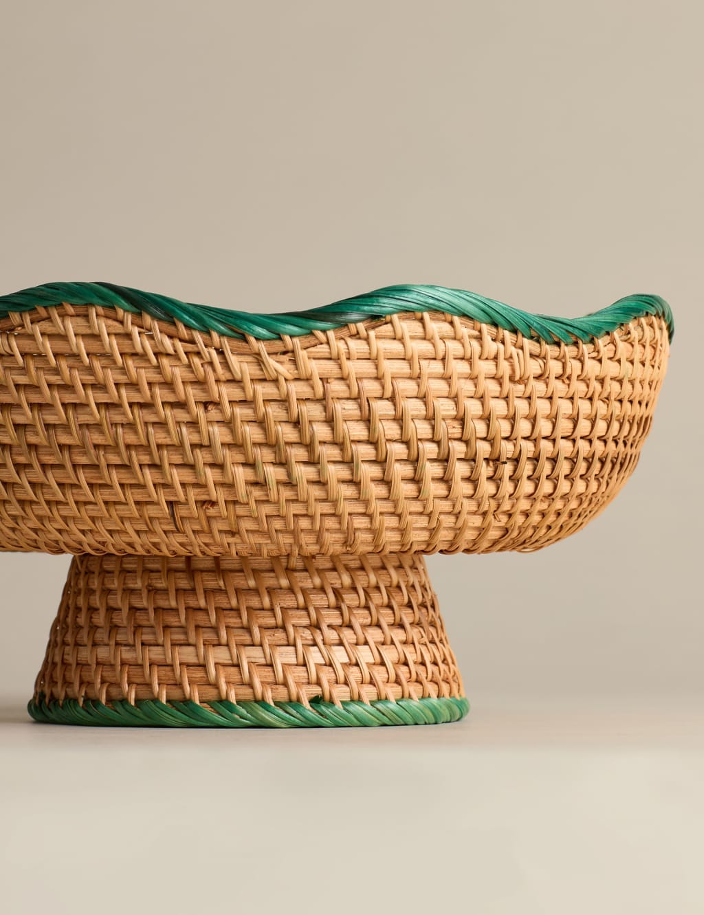 Rattan bowl with green trim