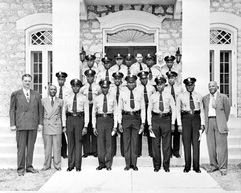 Black officers graduating from the Miami Police Academy at Halissee Hall in 1952. 