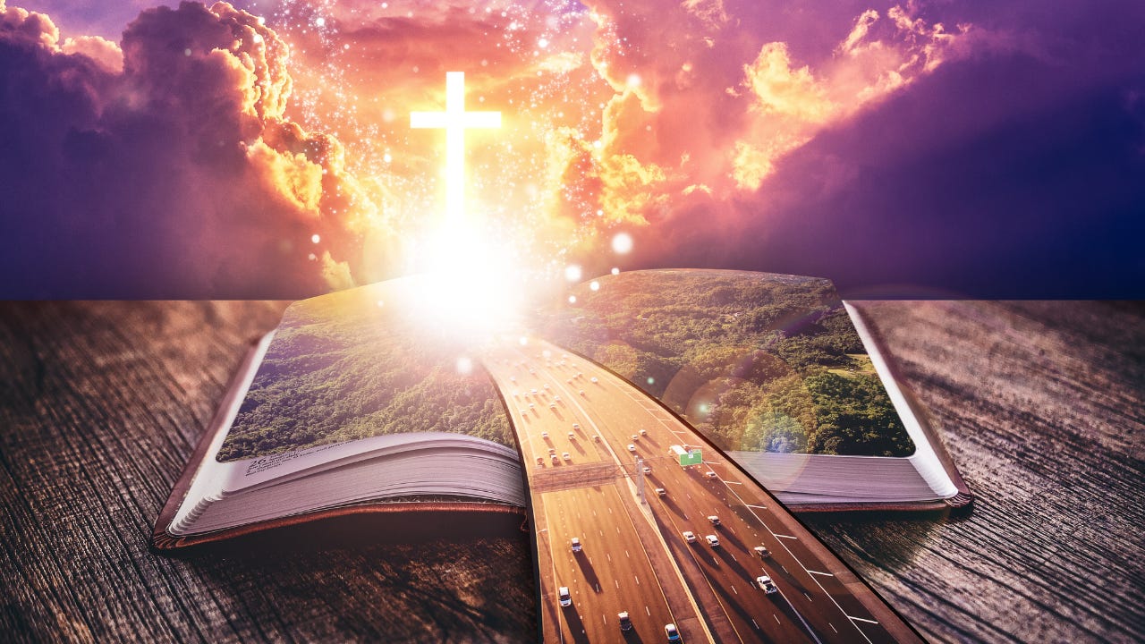 A book opened with the cross and a road leading to the cross.