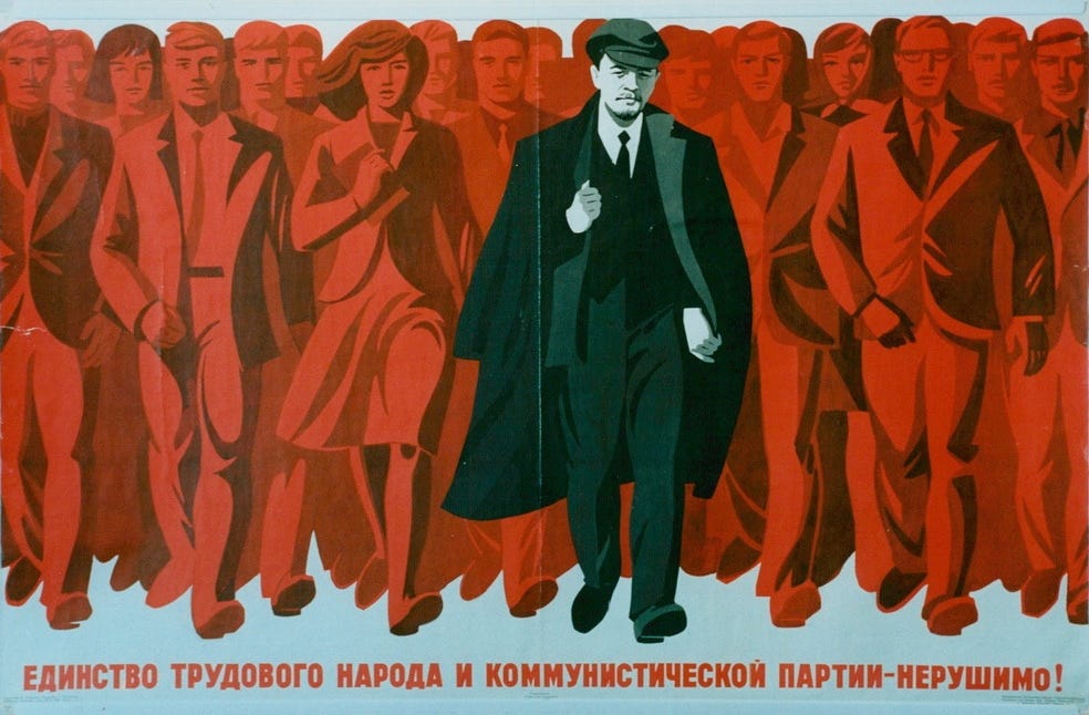 horizontal poster of man in black walking front and centre while people behind him in business attire follow