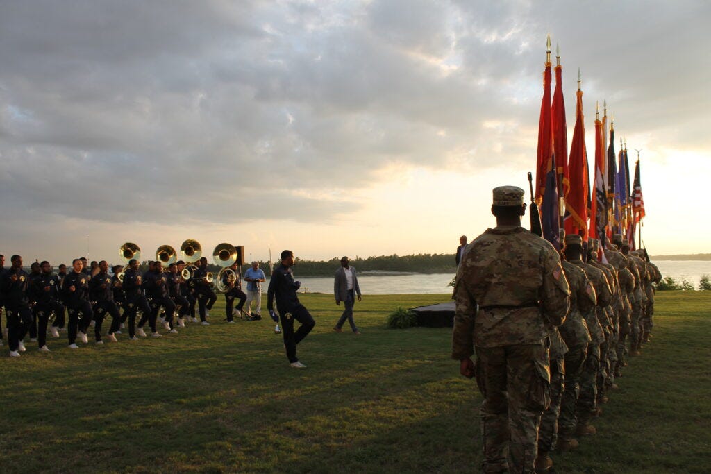 The Southern University ROTC Color Guard and “Human Jukebox” marching band perform for guests at the  Mississippi River Cities & Towns Initiative annual conference on Sept. 17, 2024.