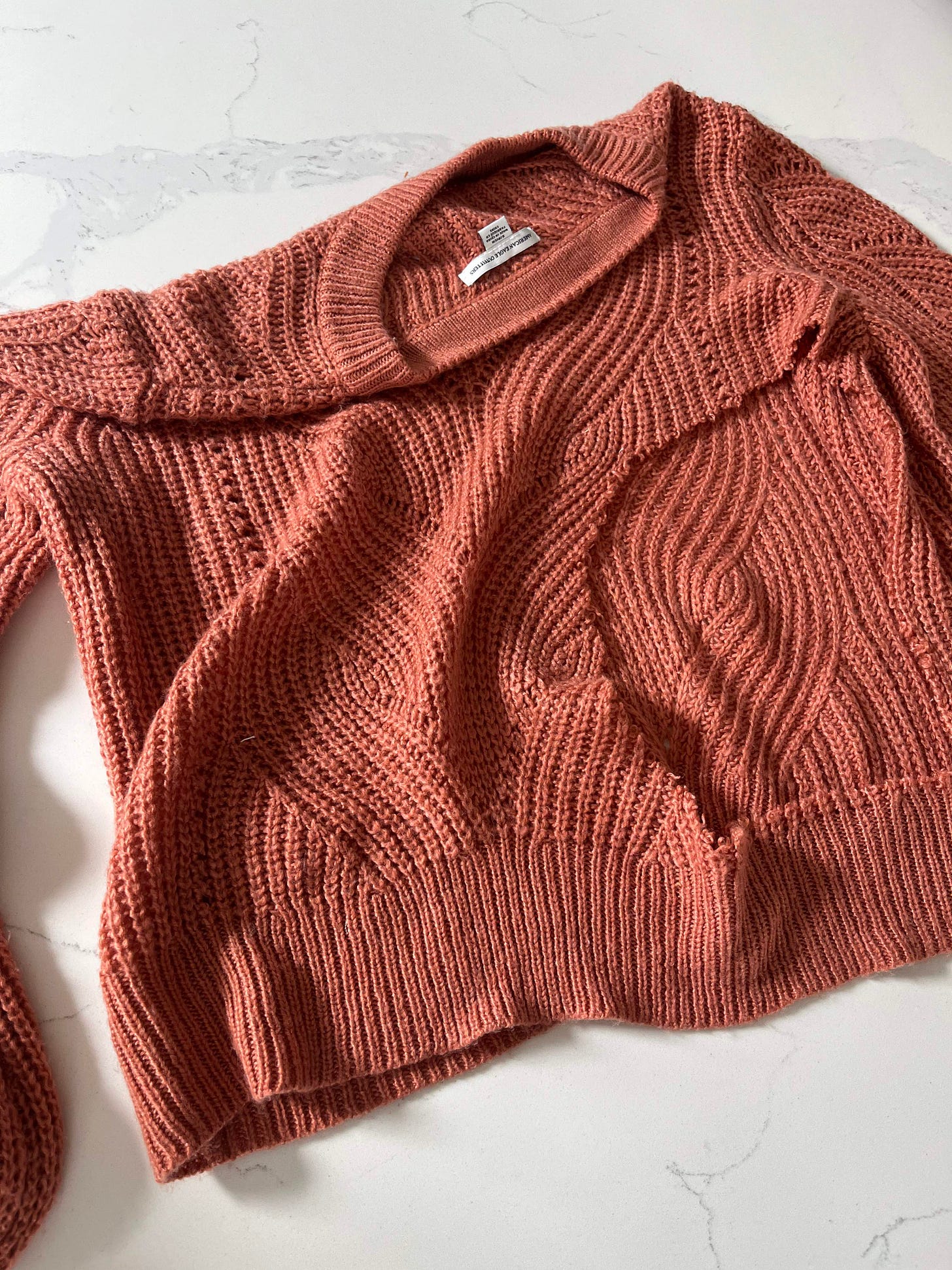 Waste damaged sweater