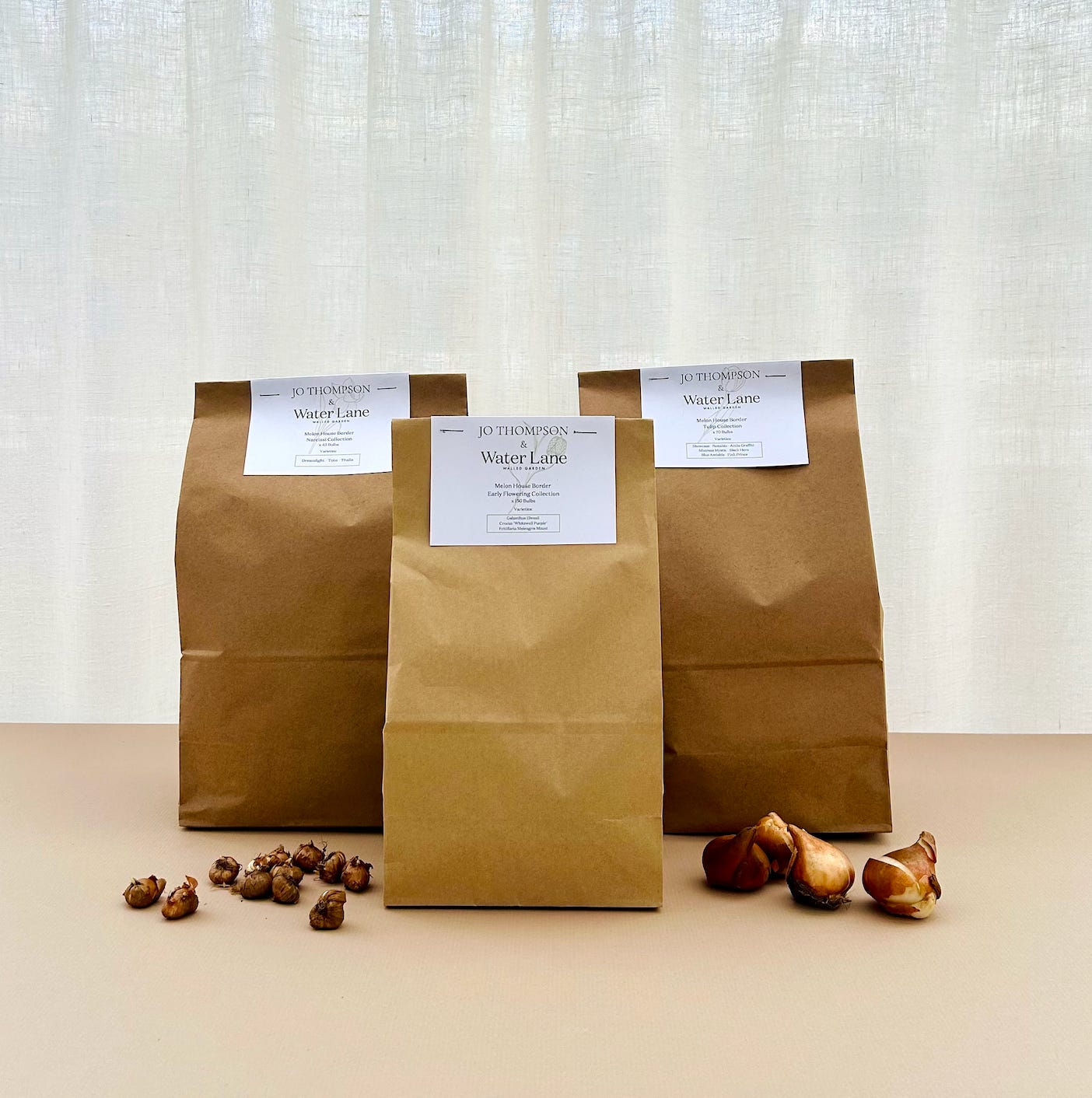 brown paper parcels of spring bulbs