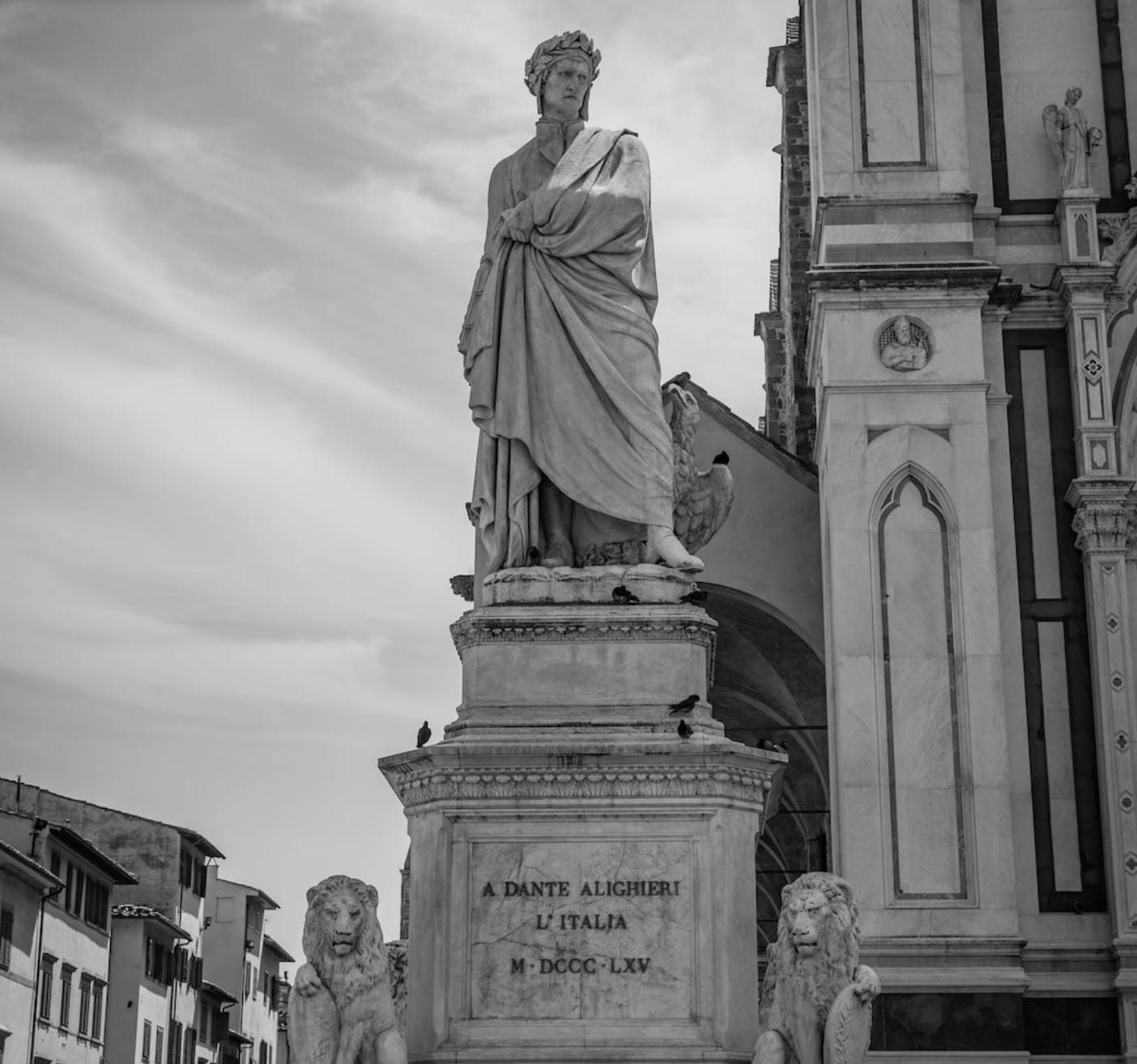 Grayscale of Dante statue