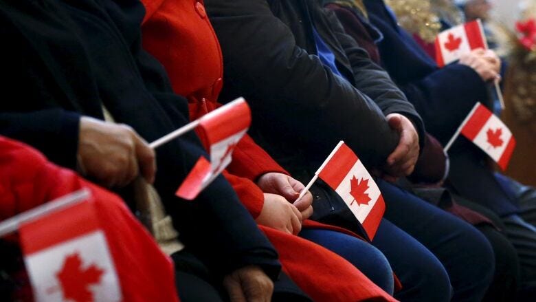 Ottawa working on program to regularize status of 500,000 immigrants | CBC  News