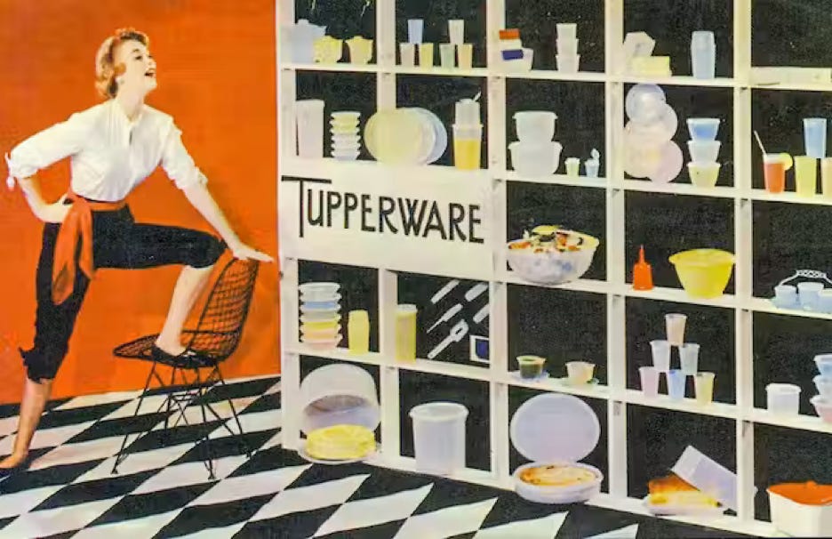 A retro Tupperware ad featuring a skinny white woman with one leg on a chair admiringly beholding a massive shelf full of Tupperware products.