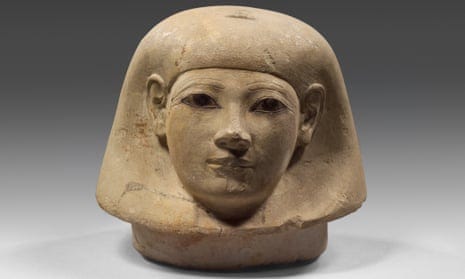A canopic jar depicting a woman’s head, seen from the front