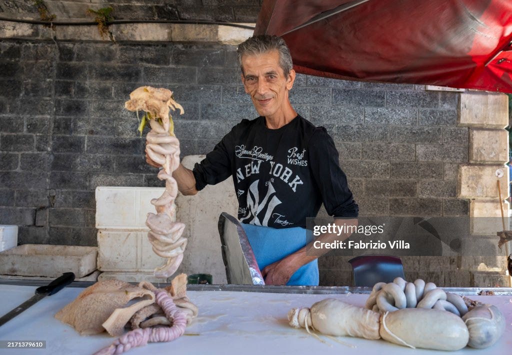 Street Vendors Put On A Show At  Catania's Historic Fish Market