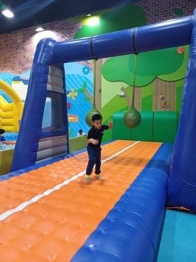 Miguel jumping on the air track in Kidzooona Robinsons Galleria