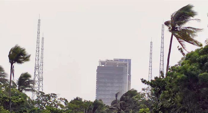 One of the launch towers at the Wenchang Space Launch Site during a storm in 2021.