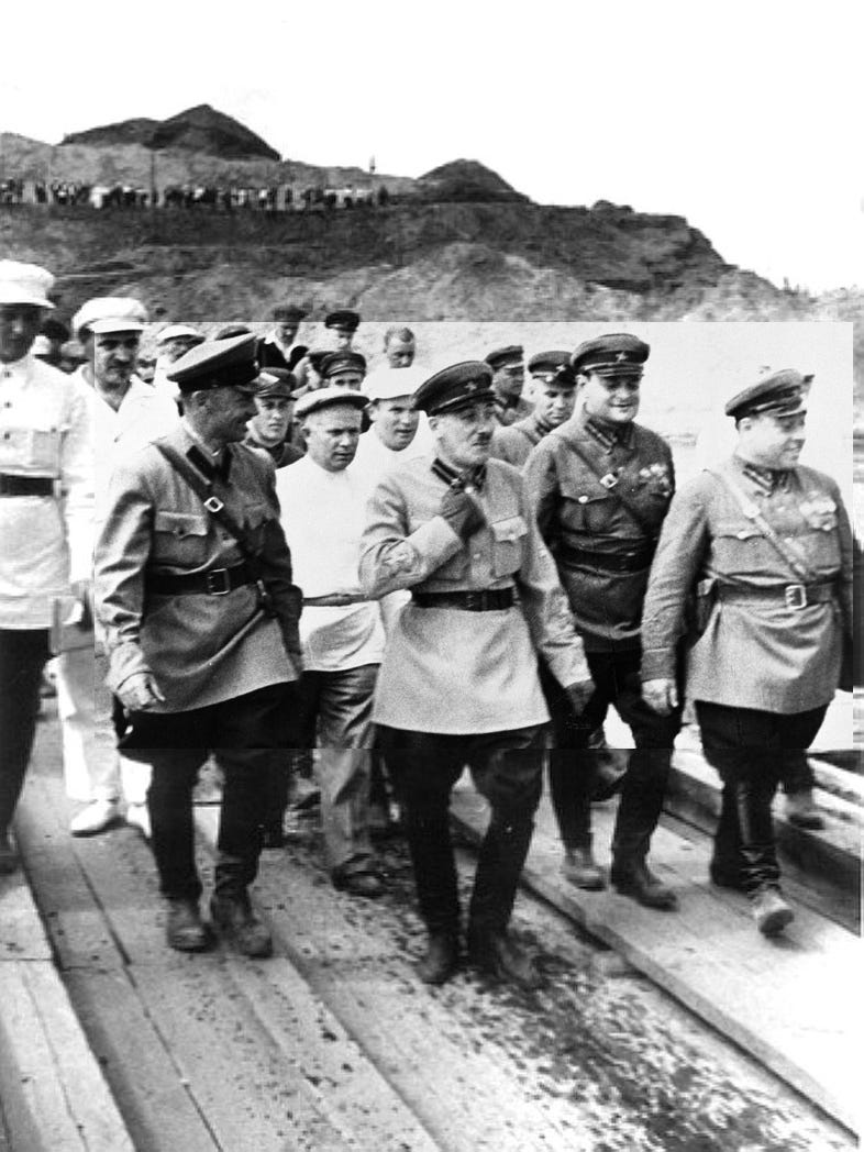 Yagoda walks with band of smiling Soviet officials.