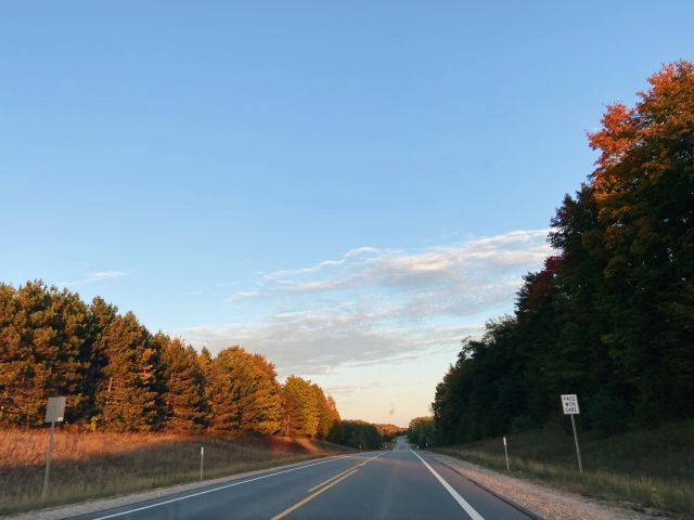 The fall road in Michigan